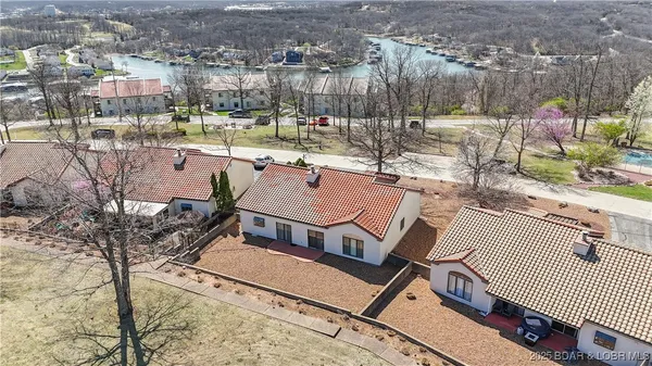 $315,000 | 590 Racquet Club Drive, Unit 406, Lake Ozark, MO 65049