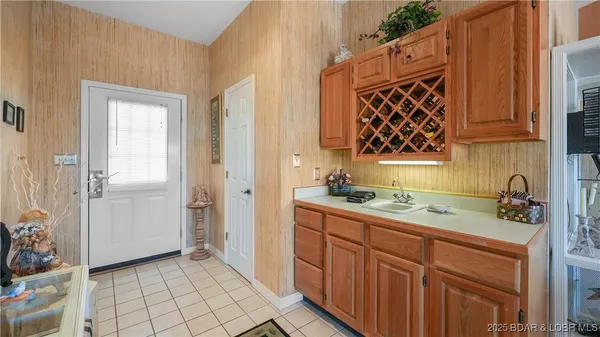 $315,000 | 590 Racquet Club Drive, Unit 406, Lake Ozark, MO 65049