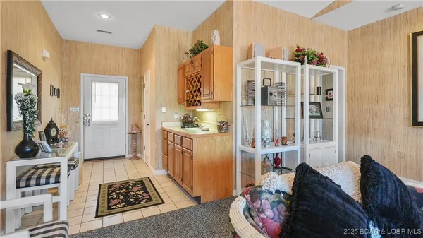 $315,000 | 590 Racquet Club Drive, Unit 406, Lake Ozark, MO 65049