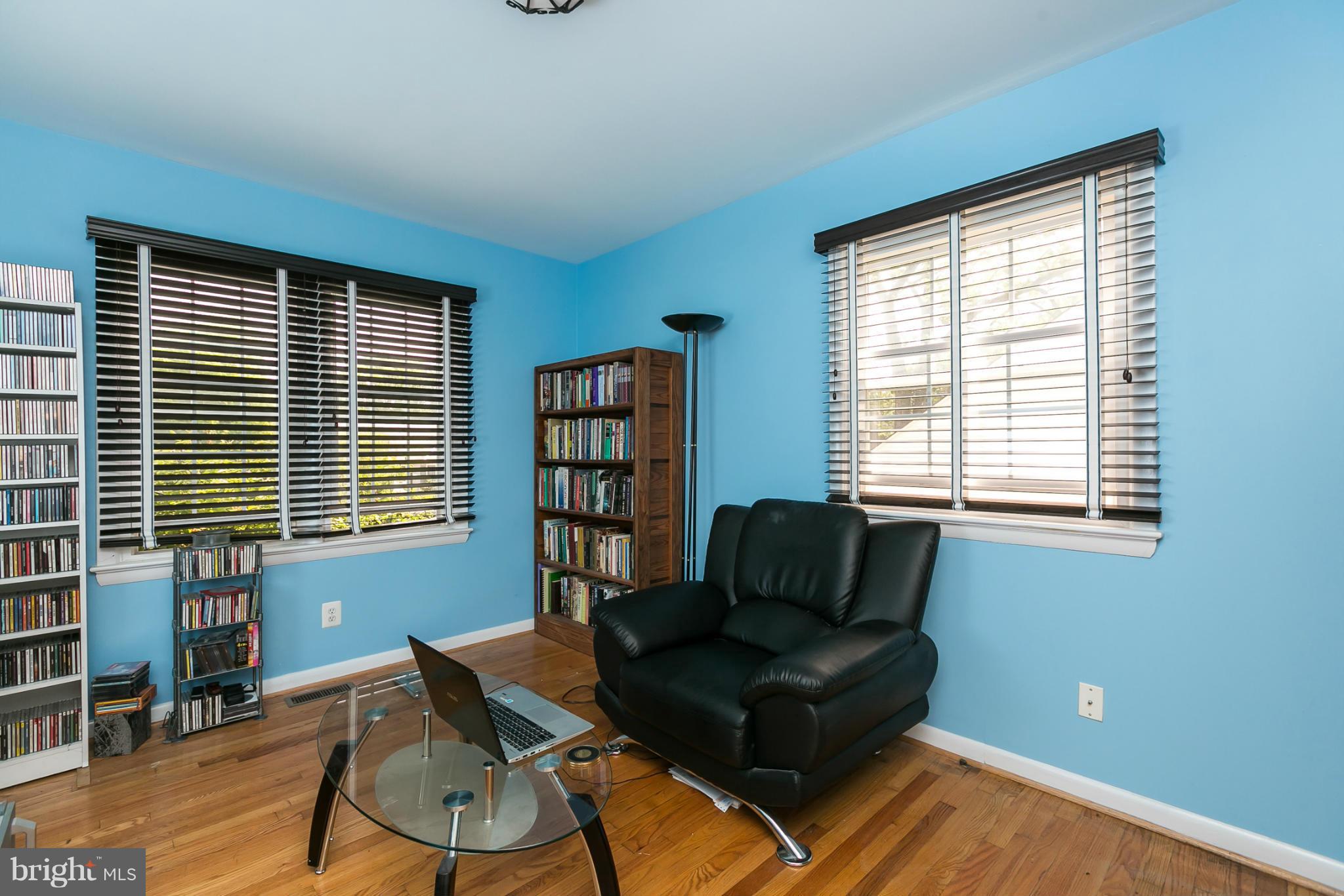12712 Flack Street Silver Spring, MD 20906 - Photo 15 of 28 a living room with furniture and a window