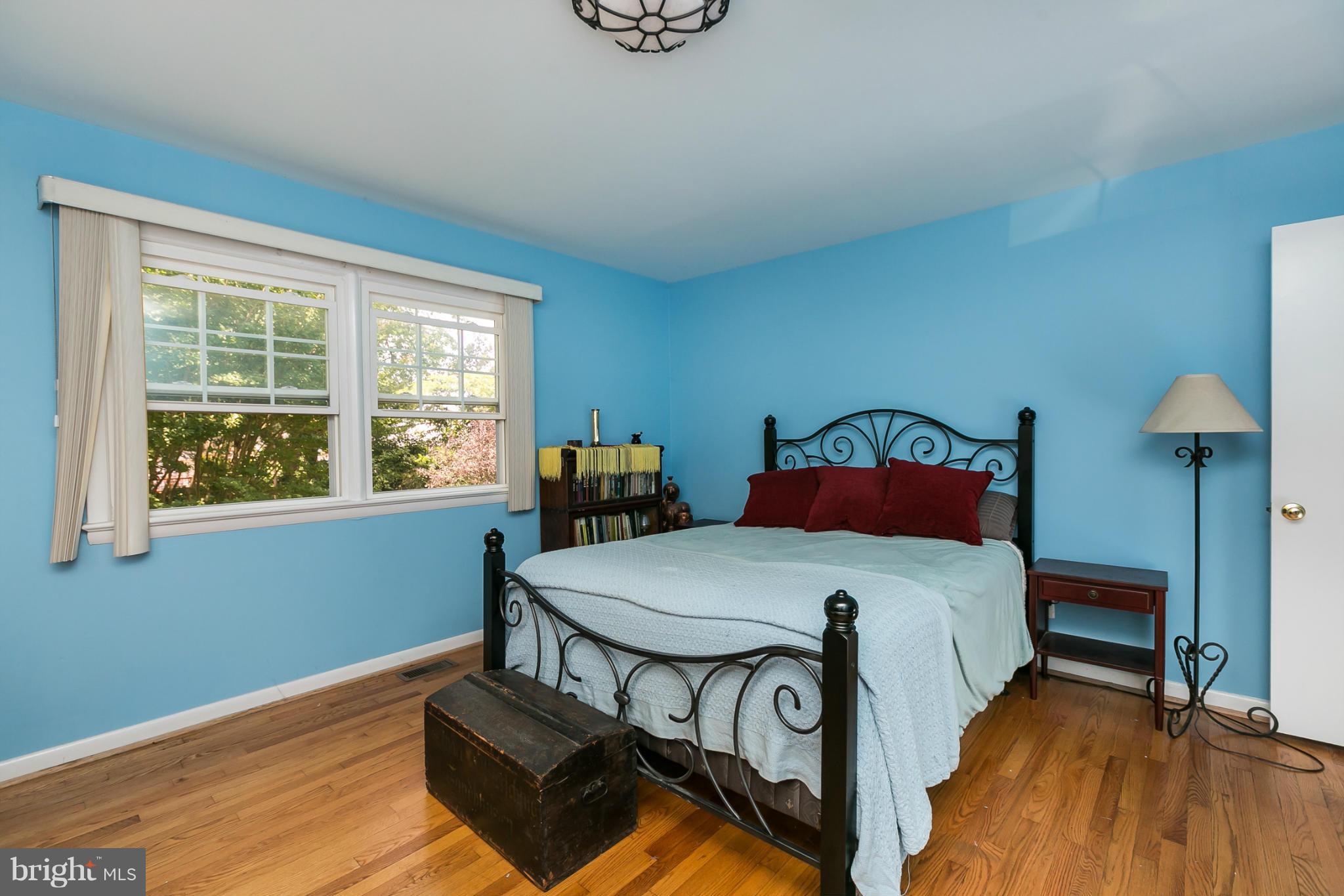 12712 Flack Street Silver Spring, MD 20906 - Photo 18 of 28 a bedroom with a bed and a window