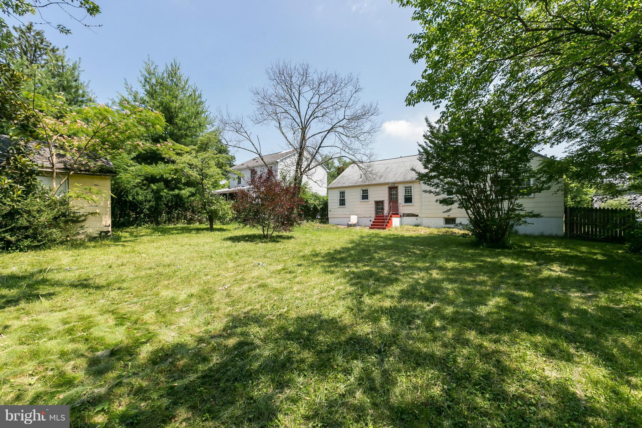 12712 Flack Street Silver Spring, MD 20906 - Photo 28 of 28 a front view of a house with a yard