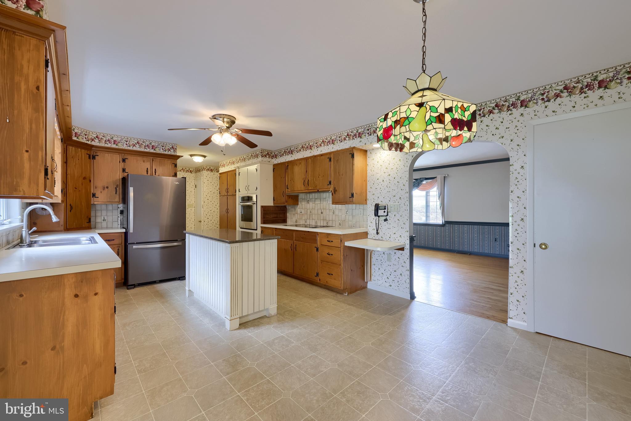 210 Stevens Road Stevens, PA 17578 - Photo 14 of 89 a view of a kitchen and microwave