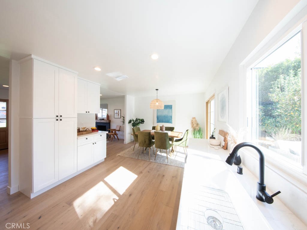 248 Crystal Lane Pasadena, CA 91103 - Photo 11 of 22 a living room with furniture and a large window