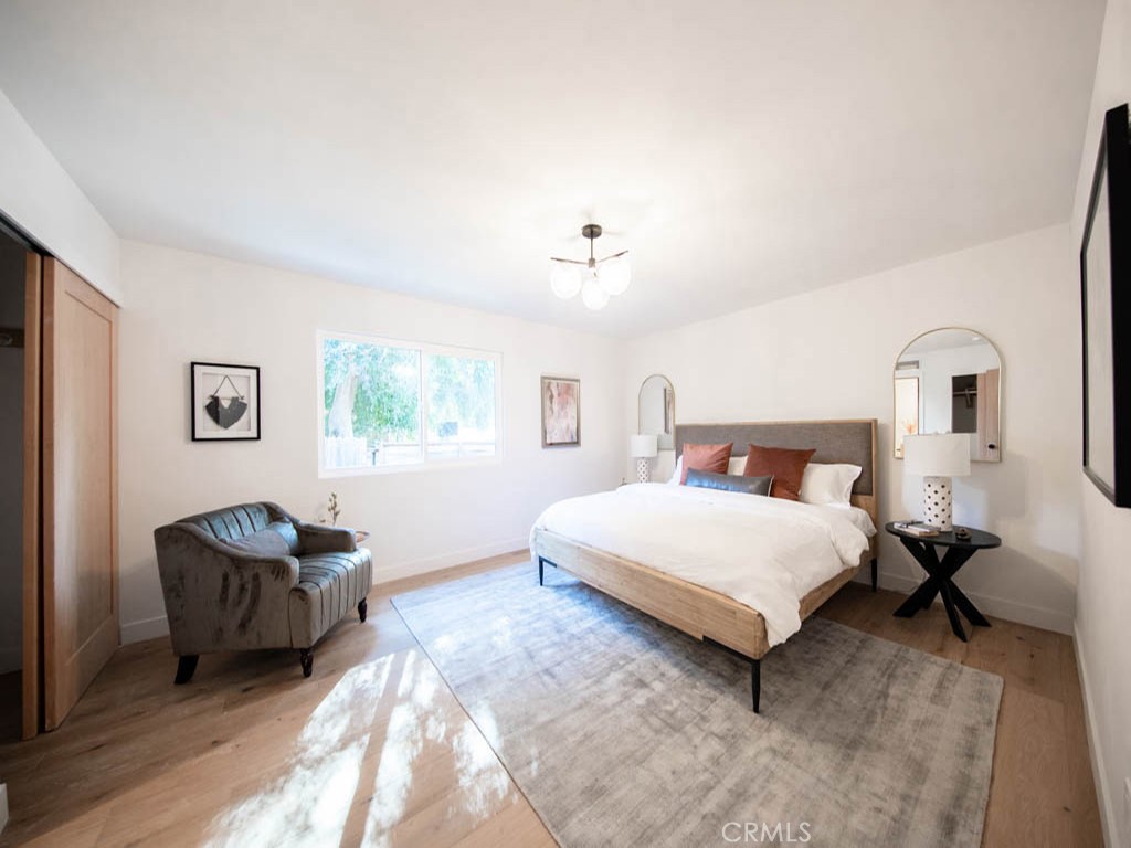 248 Crystal Lane Pasadena, CA 91103 - Photo 14 of 22 a bedroom with a bed and window