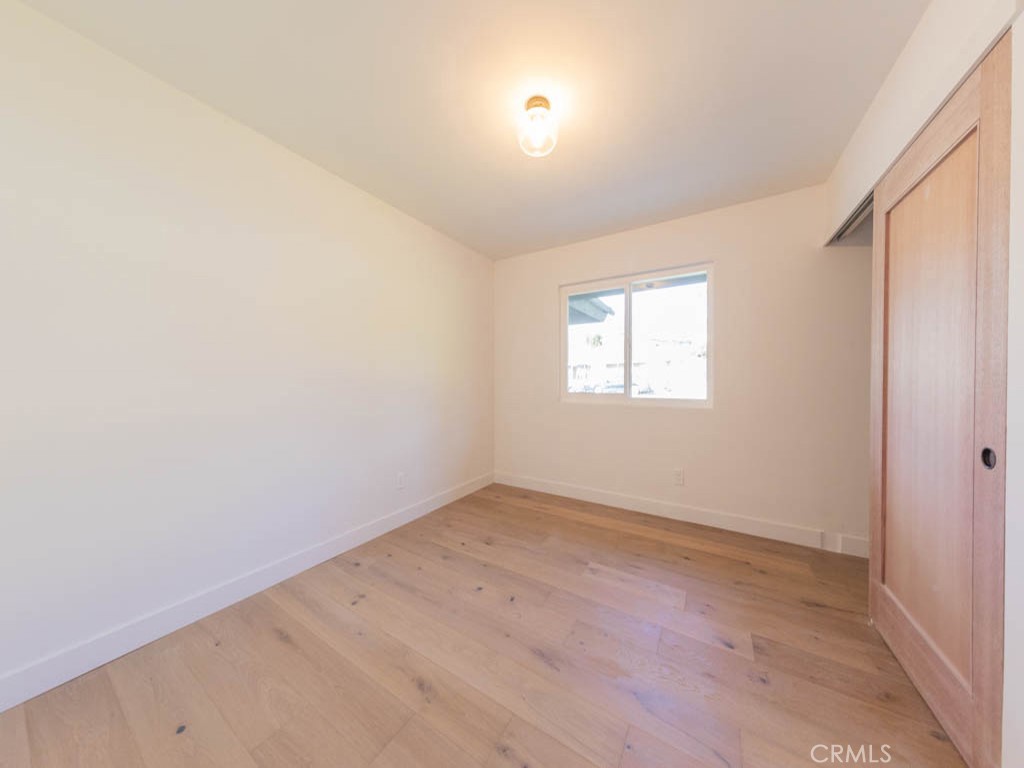 248 Crystal Lane Pasadena, CA 91103 - Photo 16 of 22 an empty room with windows