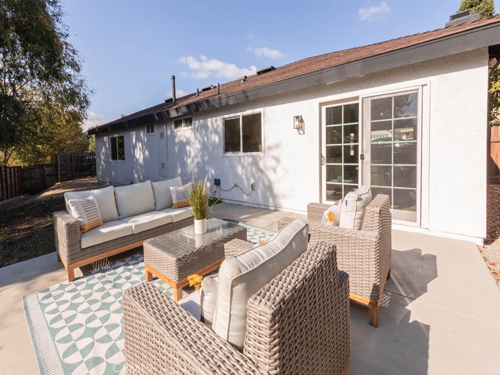 248 Crystal Lane Pasadena, CA 91103 - Photo 20 of 22 a outdoor space with patio the couches and a potted plant