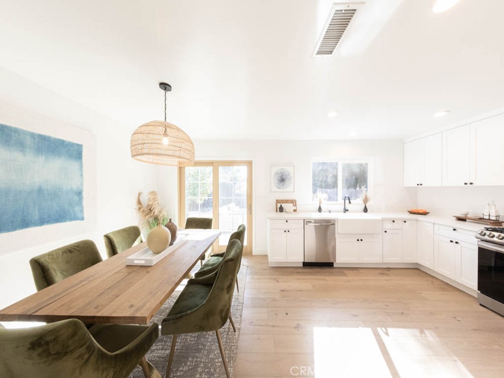 248 Crystal Lane Pasadena, CA 91103 - Photo 9 of 22 a kitchen with furniture and chandelier