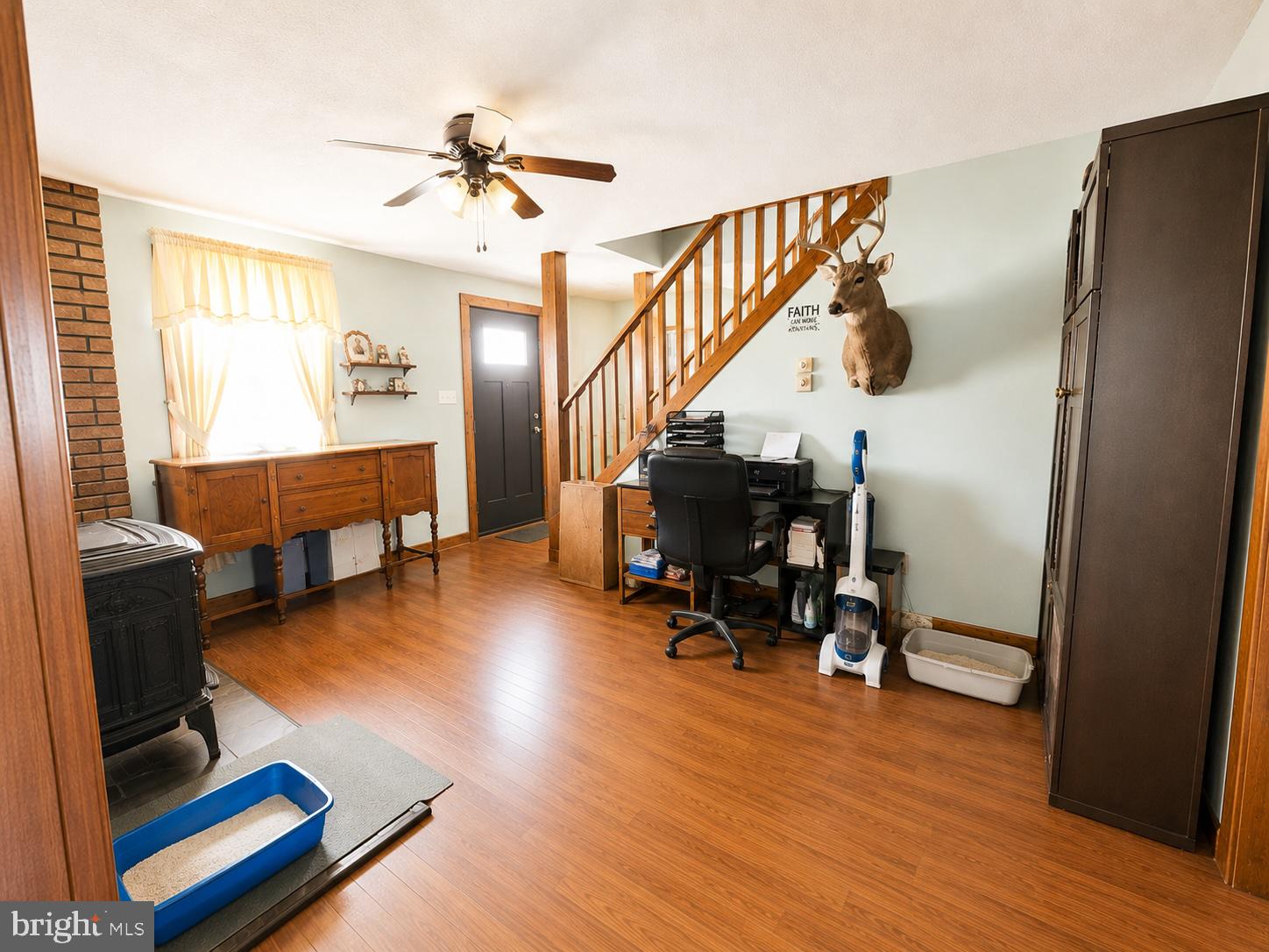 5125 Rhodesdale Road Rhodesdale, MD 21659 - Photo 23 of 50 a room with wooden floor and furniture