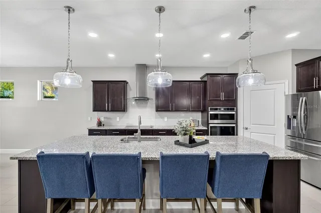 a white toilet sitting next to a wooden wall