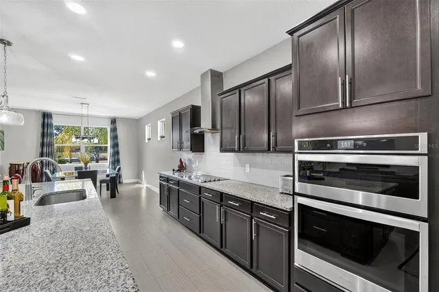 a bedroom with a bed and a potted plant
