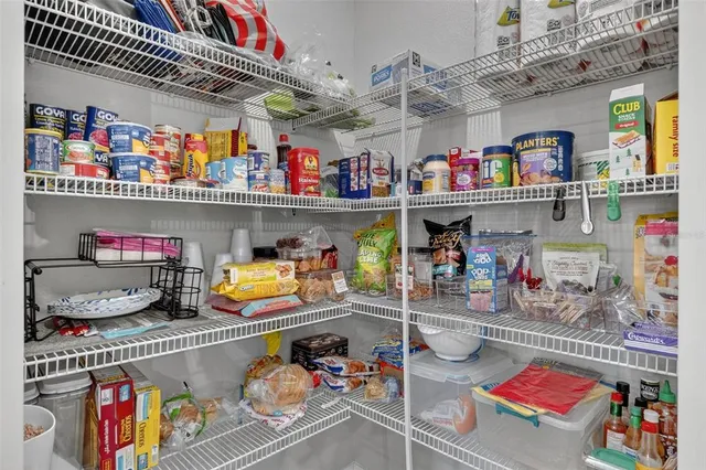 a bathroom with a toilet a sink and a mirror