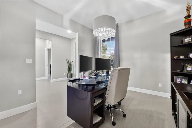 a view of a house with a yard and a garden