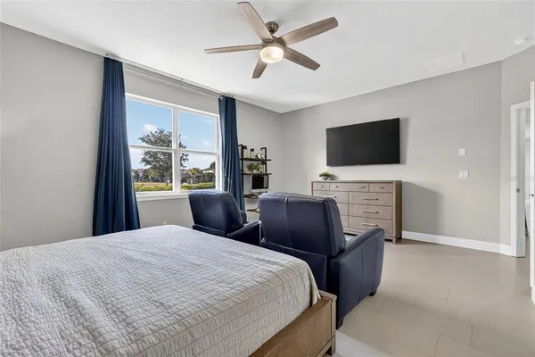 an aerial view of a house with a swimming pool
