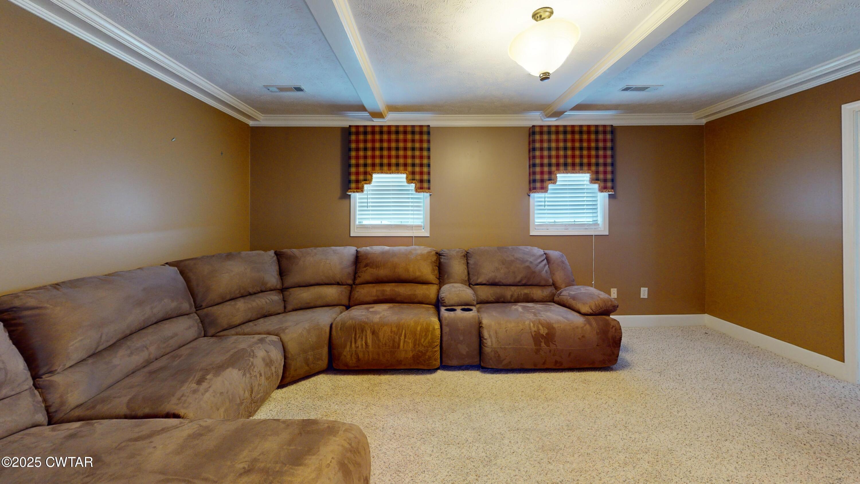 783 Sharps Ferry Road Newbern, TN 38059 - Photo 37 of 50 a living room with furniture and windows