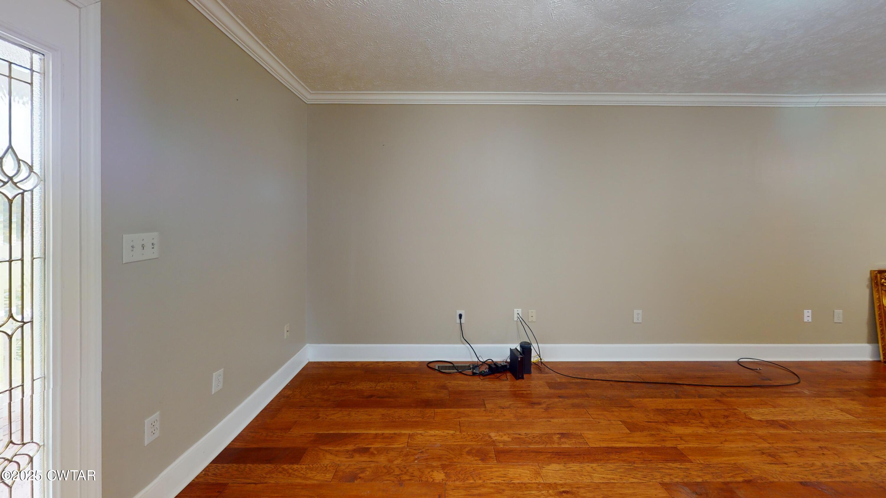 783 Sharps Ferry Road Newbern, TN 38059 - Photo 6 of 50 a view of a room with an empty space and window