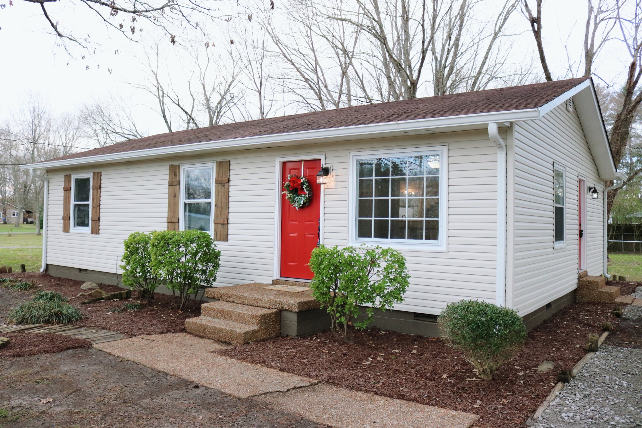 3322 Fann Road Murfreesboro, TN 37128 - Photo 1 of 29 a front view of a house with garden
