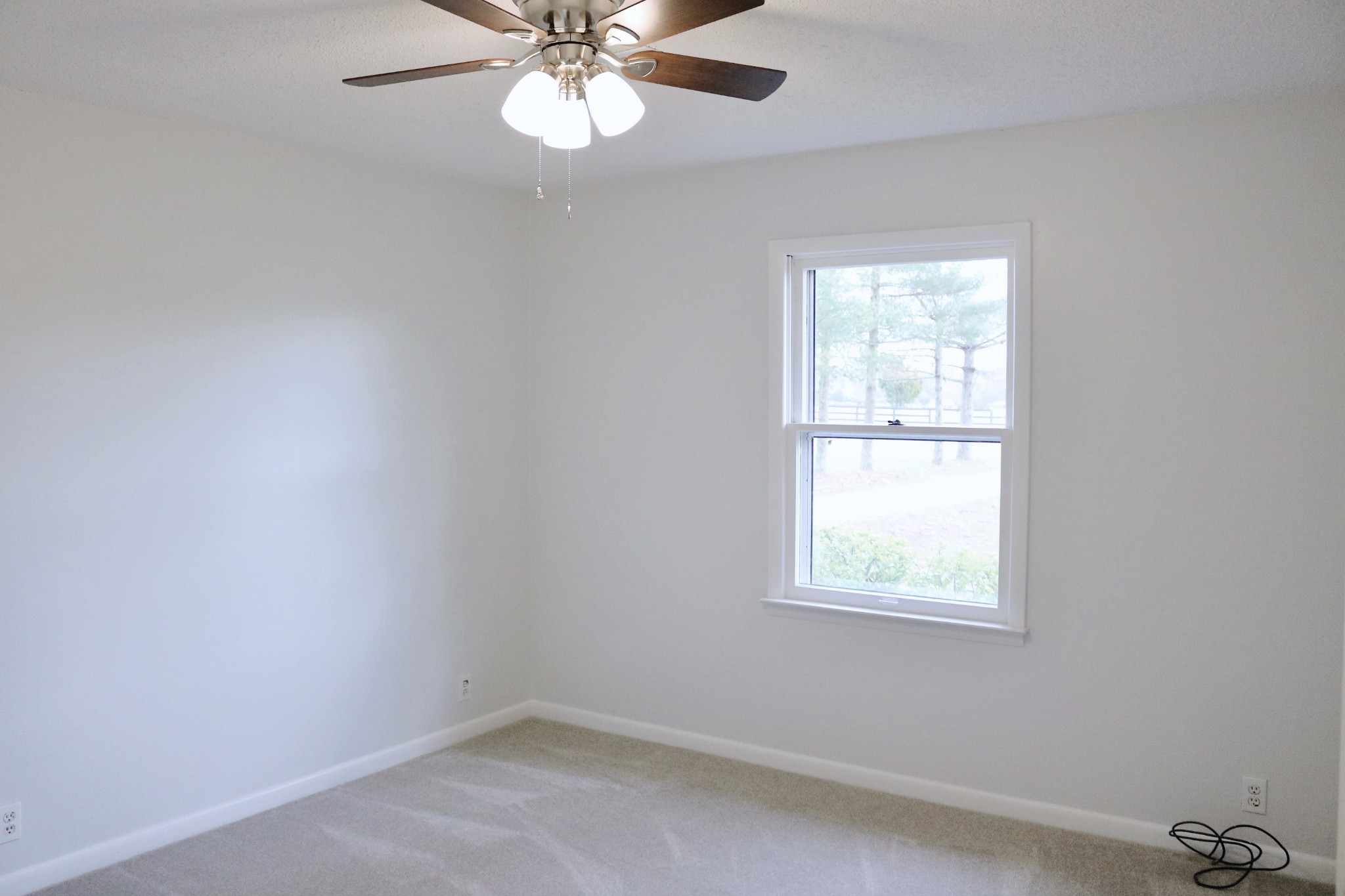 3322 Fann Road Murfreesboro, TN 37128 - Photo 20 of 29 an empty room with a window and a fan