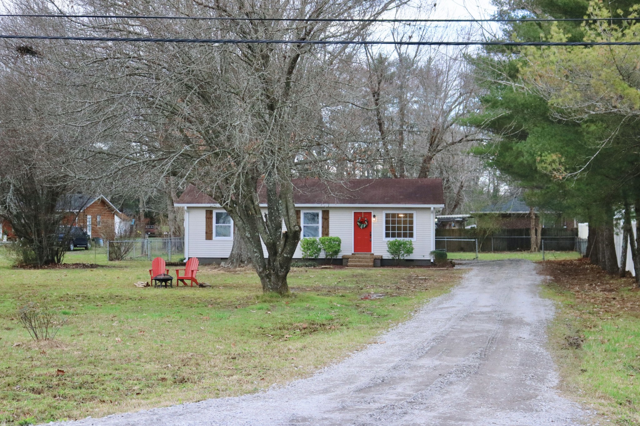 3322 Fann Road Murfreesboro, TN 37128 - Photo 3 of 29 a front view of a house with a yard and trees