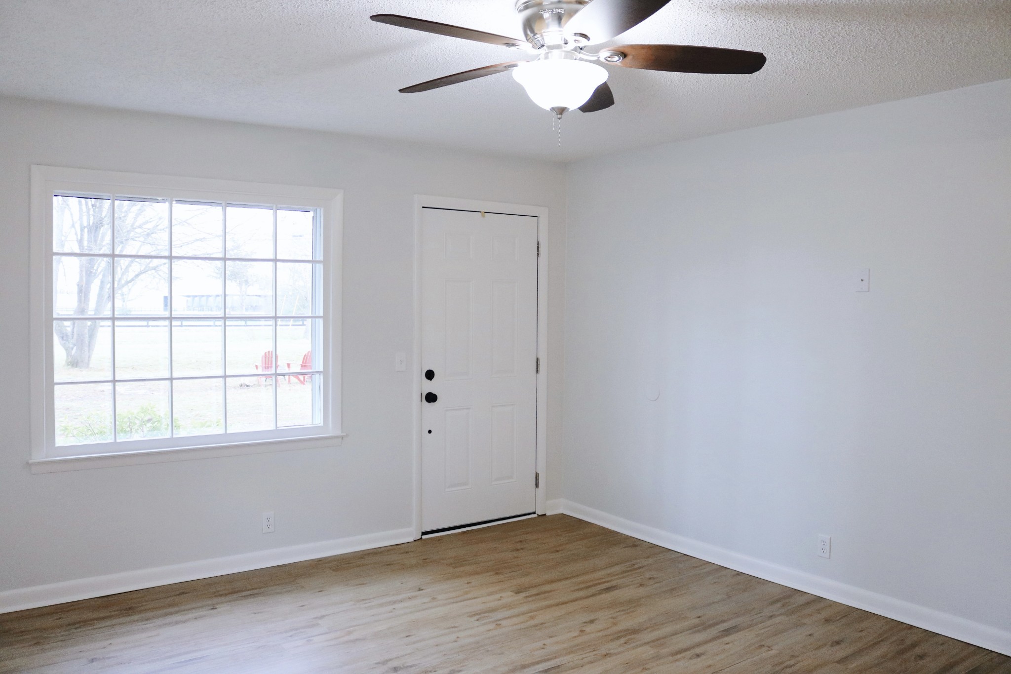 3322 Fann Road Murfreesboro, TN 37128 - Photo 7 of 29 wooden floor in an empty room with a window