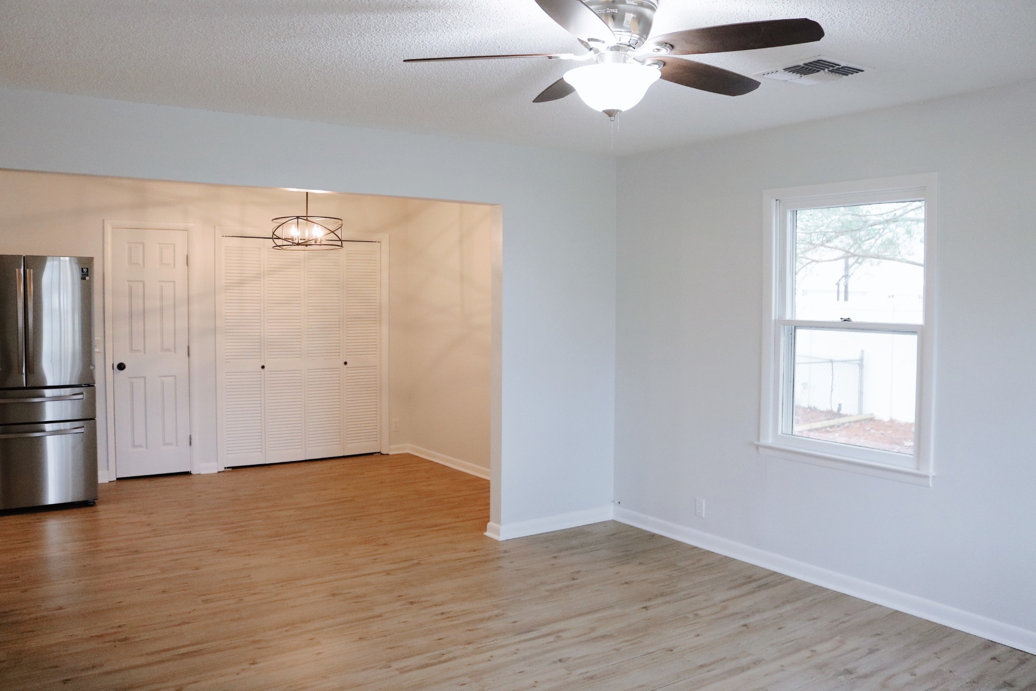 3322 Fann Road Murfreesboro, TN 37128 - Photo 8 of 29 wooden floor in an empty room with a window