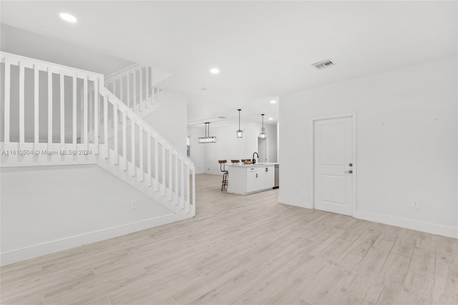 12743 Southwest 211th Street Miami, FL 33177 - Photo 12 of 38 a view of an empty room