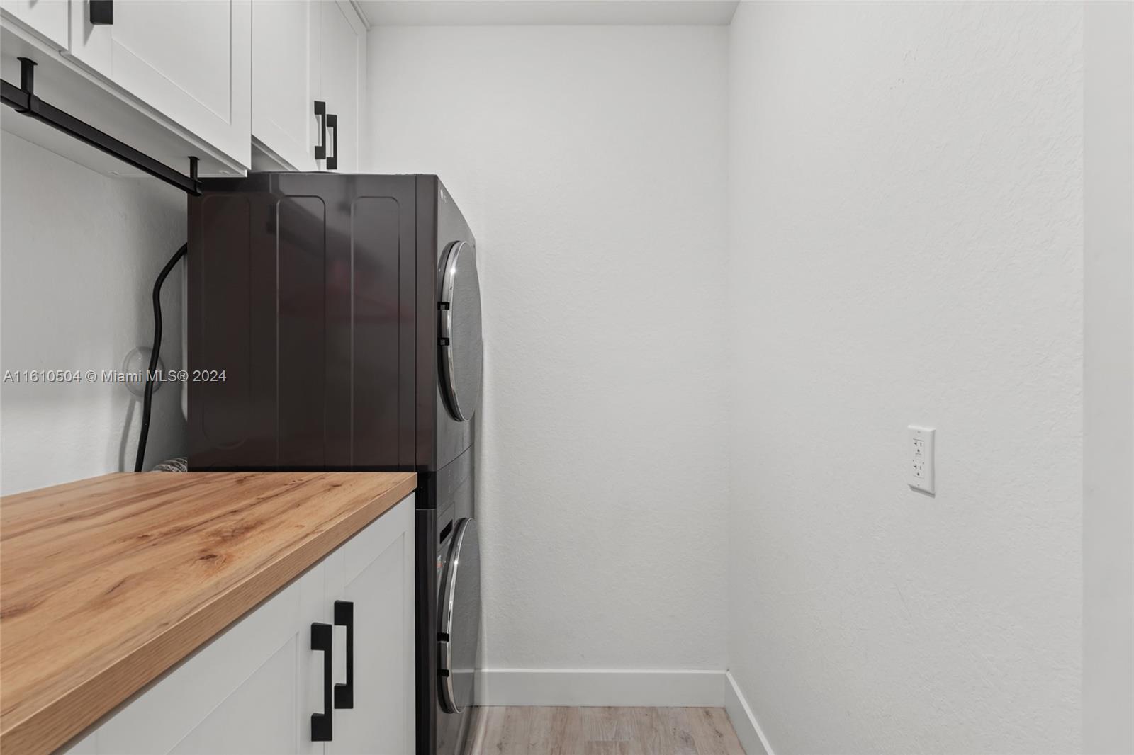 12743 Southwest 211th Street Miami, FL 33177 - Photo 21 of 38 a utility room with a washer and dryer