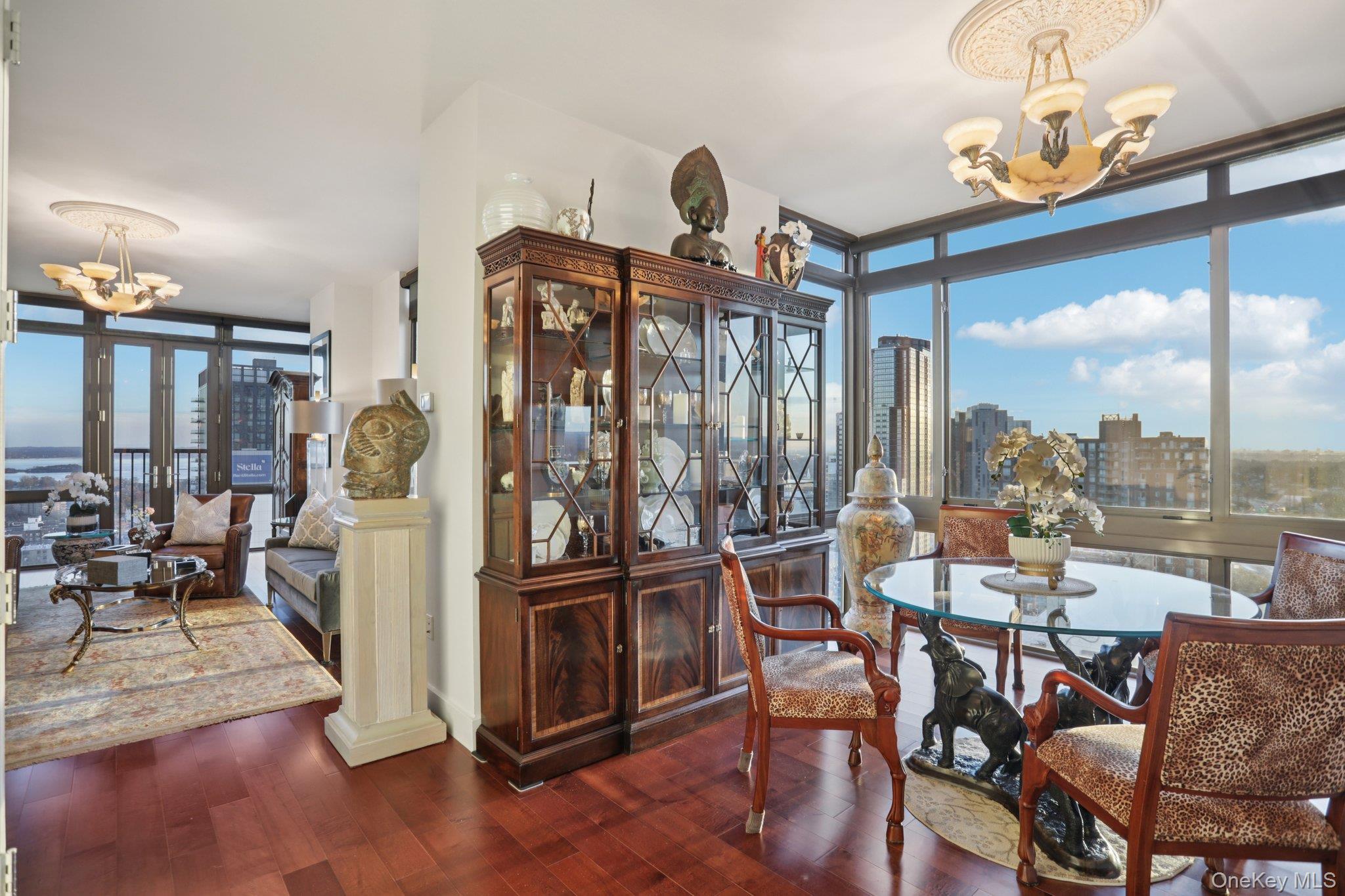 175 Huguenot Street, Unit 2403 New Rochelle, NY 10801 - Photo 14 of 30 a view of a dining room with furniture window and outside view