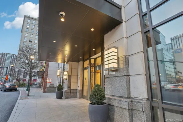 a view of a building with glass door and glass door