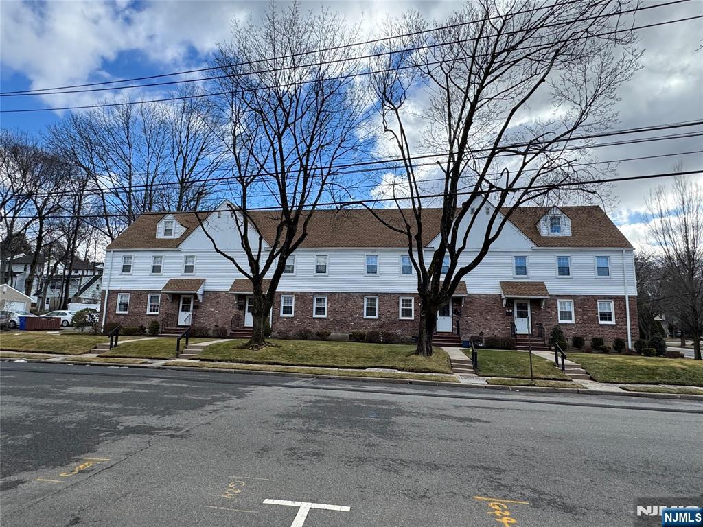 a view of a building with a lot of trees