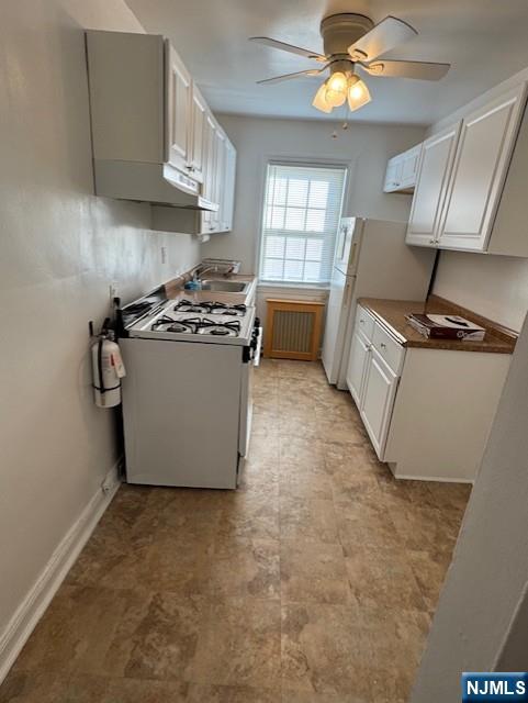 2-8 New Street, Unit 8A Tenafly, NJ 07670 - Photo 13 of 29 a kitchen with stainless steel appliances granite countertop a stove a sink dishwasher and a refrigerator