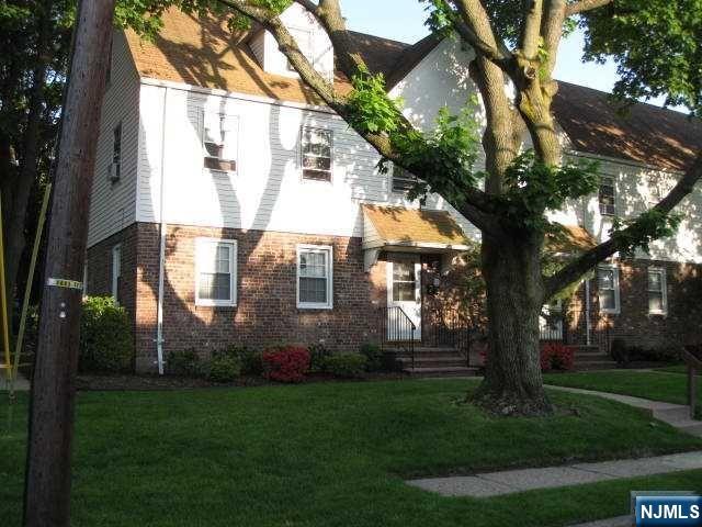 2-8 New Street, Unit 8A Tenafly, NJ 07670 - Photo 2 of 29 a view of house with backyard