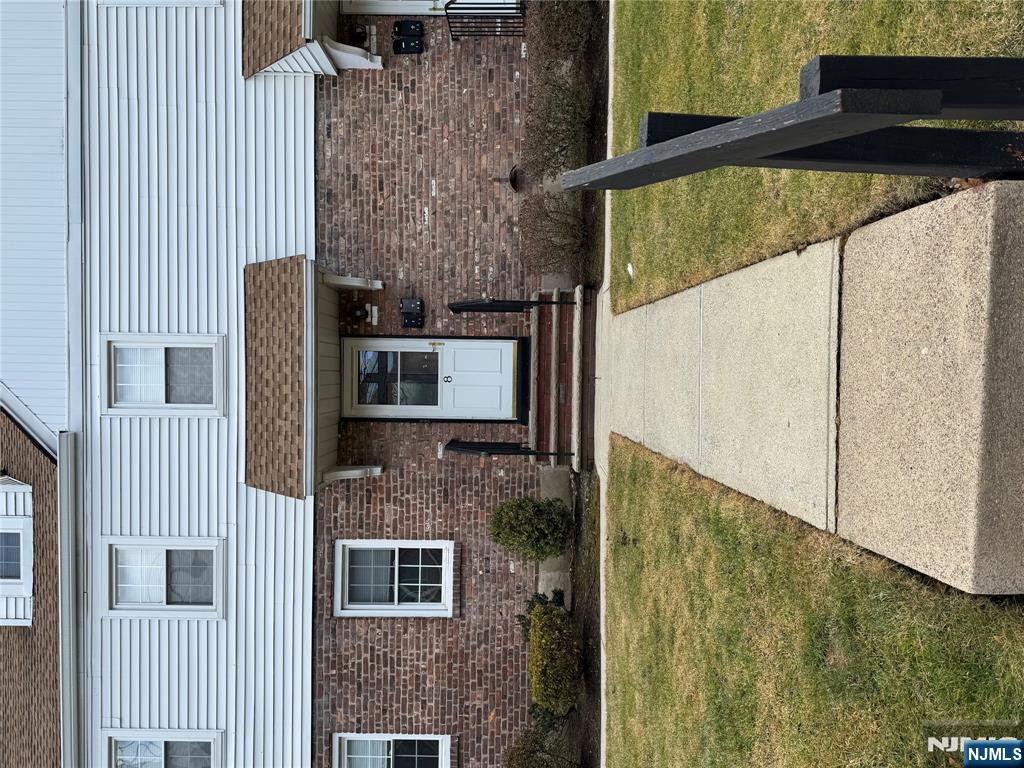 2-8 New Street, Unit 8A Tenafly, NJ 07670 - Photo 28 of 29 a front view of a house with swimming pool
