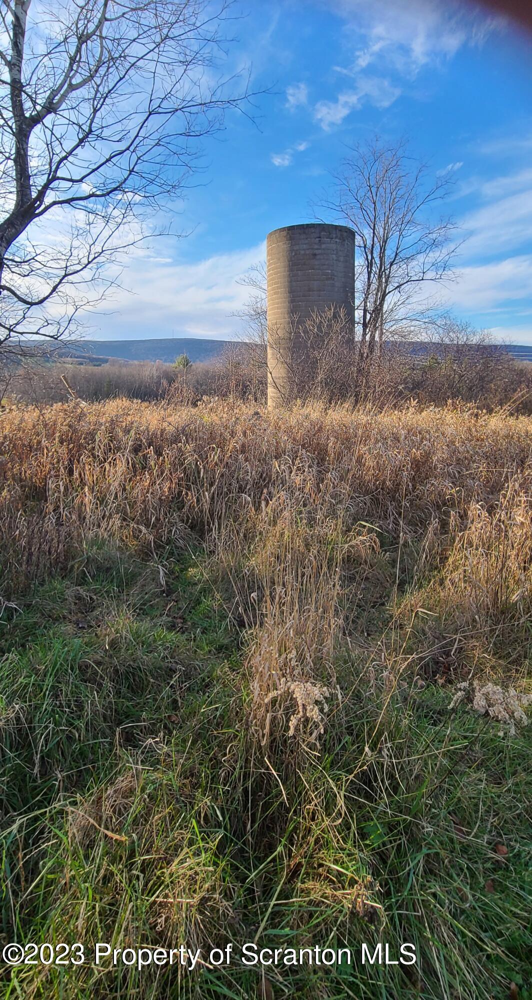 187 Faller Road Lake Ariel, PA 18436 - Photo 3 of 3 a view of a yard with wooden fence