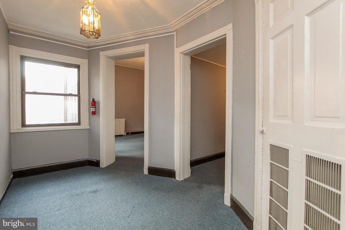 18 West Franklin Street Baltimore, MD 21201 - Photo 15 of 58 a view of an empty room with a window