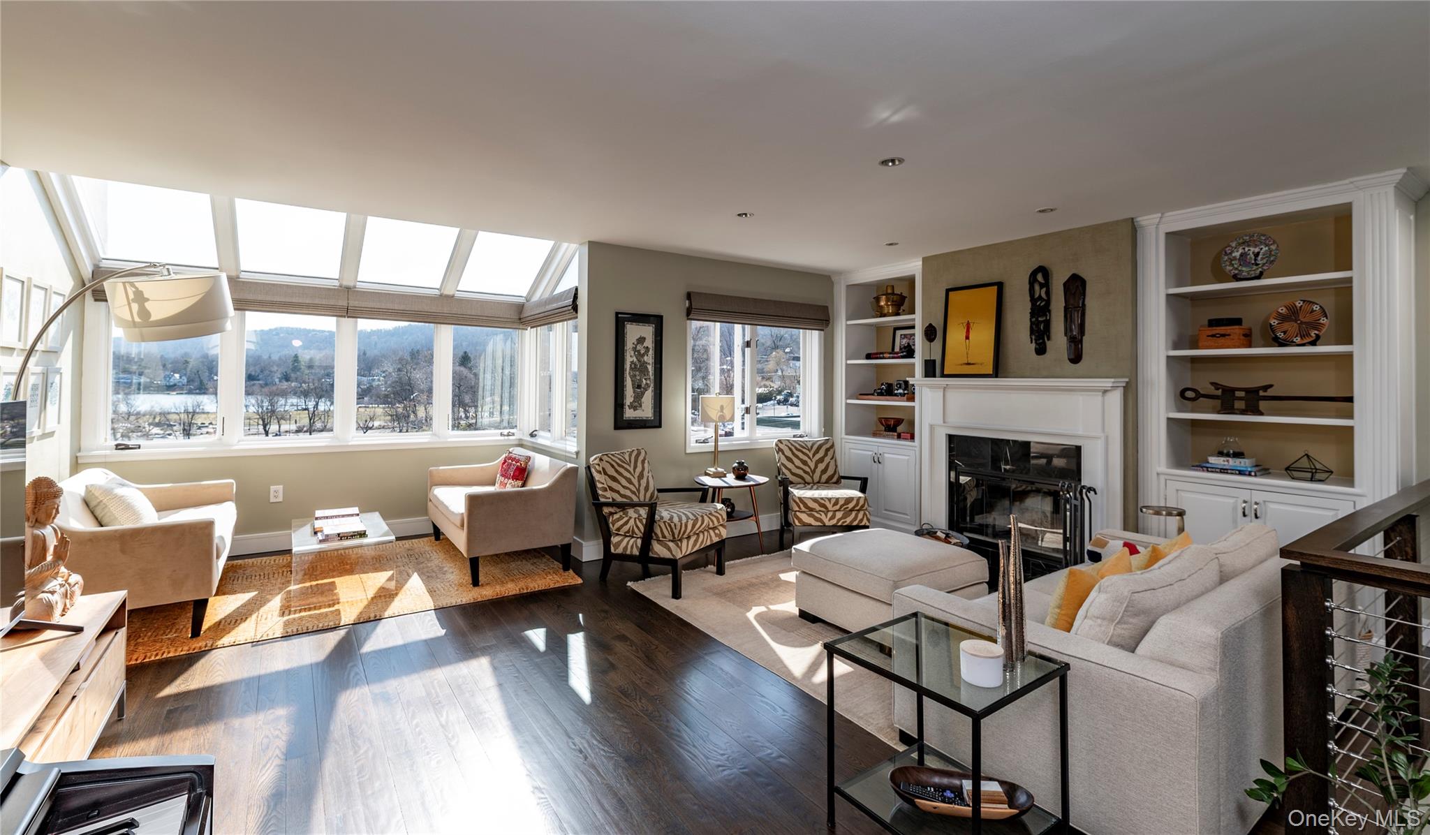 6 Burd Street, Unit 2403 Nyack, NY 10960 - Photo 3 of 29 Multiple seating areas with river and bridge views and fireplace