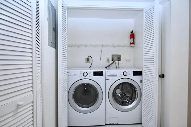 a utility room with dryer and washer
