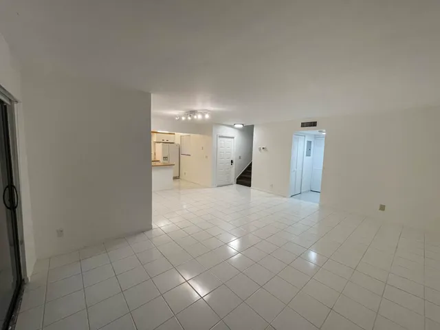 a view of a big room with entryway