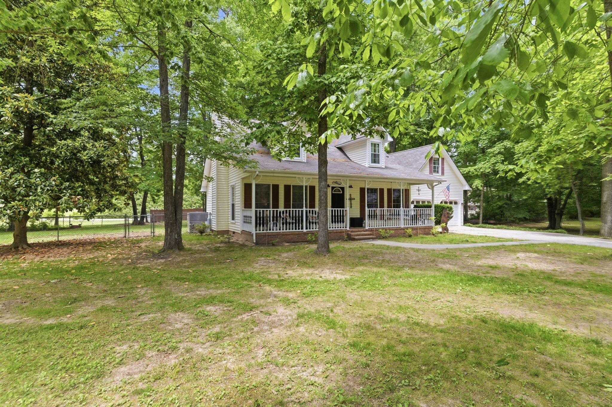 99 Smoke Rise Circle Manchester, TN 37355 - Photo 1 of 45 a front view of a house with a garden
