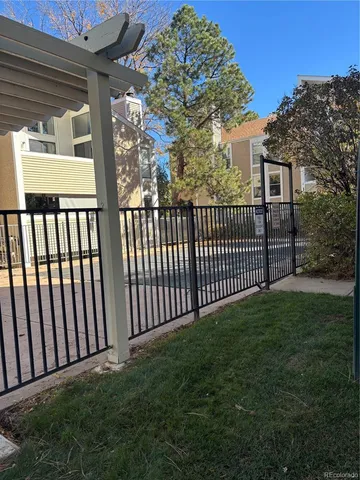 a view of a porch with a small yard