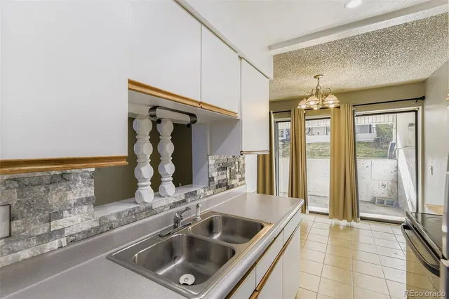 a bathroom with a sink and a large mirror