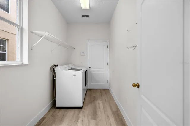 a utility room with a washer and dryer