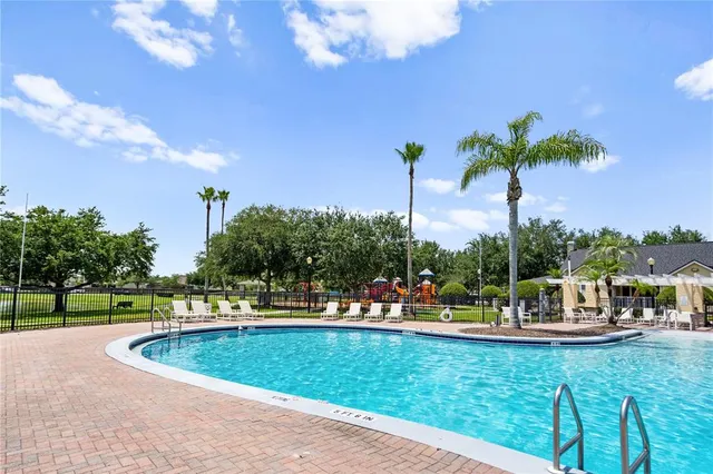 a view of a swimming pool and a terrace