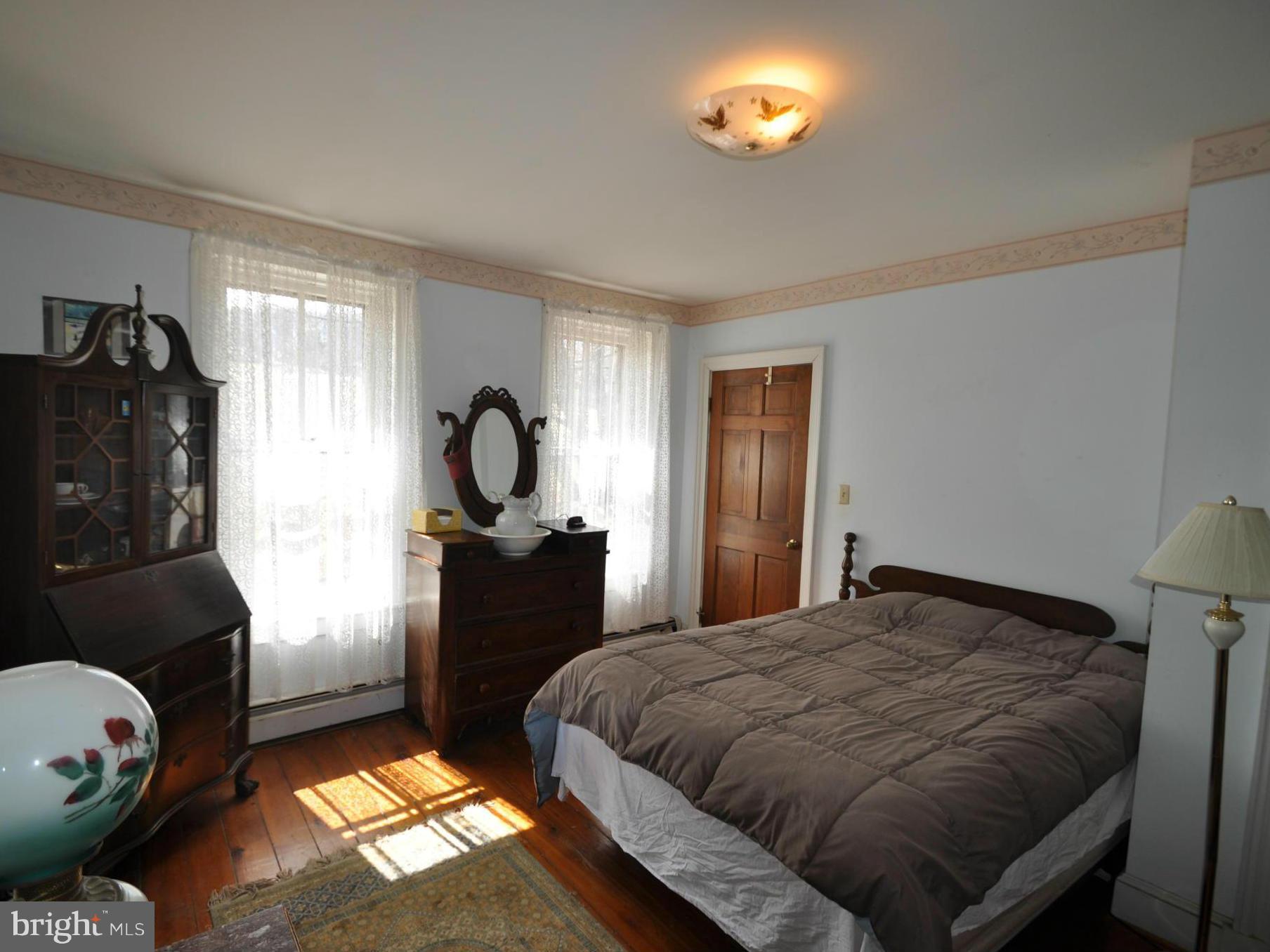 1206 Stone Road Westminster, MD 21158 - Photo 14 of 27 GLEAMING HARDWOODS THROUGHOUT THE UPSTAIRS