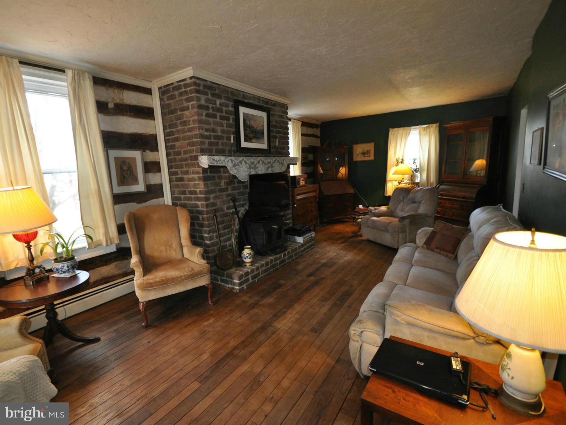 1206 Stone Road Westminster, MD 21158 - Photo 6 of 27 LARGE LIVING ROOM MAIL LEVEL WITH WOODSTOVE
