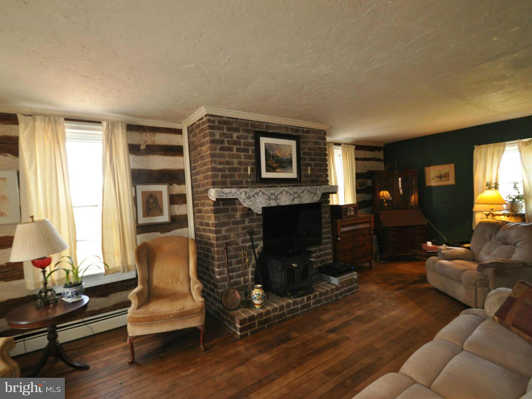 1206 Stone Road Westminster, MD 21158 - Photo 7 of 27 EXPOSED LOGS HARD WOOD FLOORS,ALL SO NICE