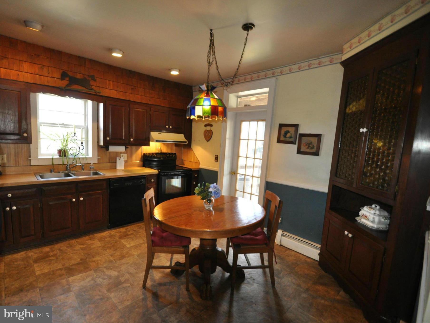 1206 Stone Road Westminster, MD 21158 - Photo 9 of 27 VERY COZY KITCHEN WITH LARGE BUILT IN CUPBOARD