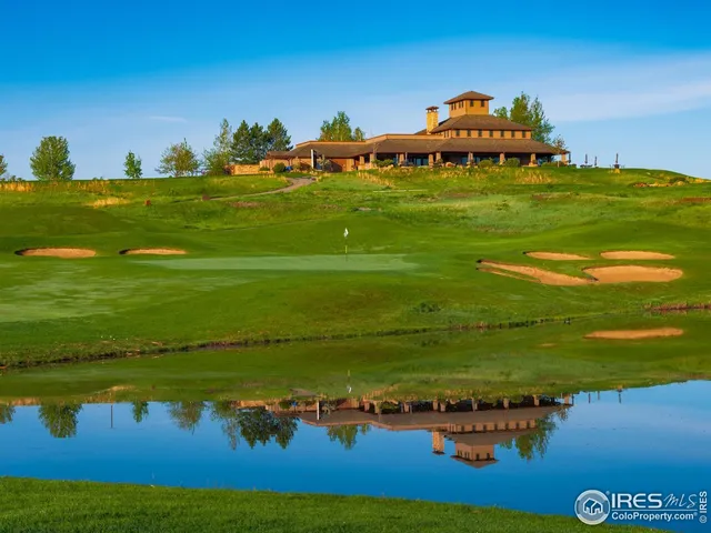 a view of a lake with a big yard