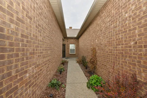 a pathway with a bathroom