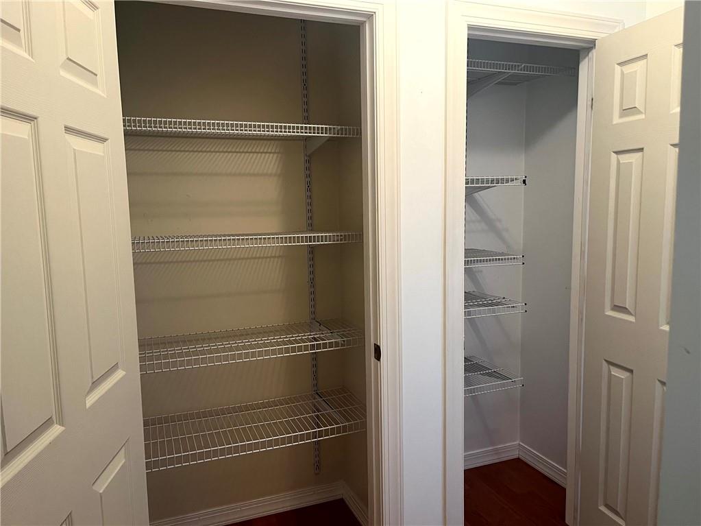 75 Cave Street Fairchance, PA 15436 - Photo 11 of 36 a walk in closet with wooden floor